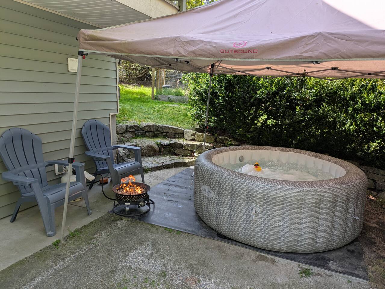 The propane fire bowl and hot tub.