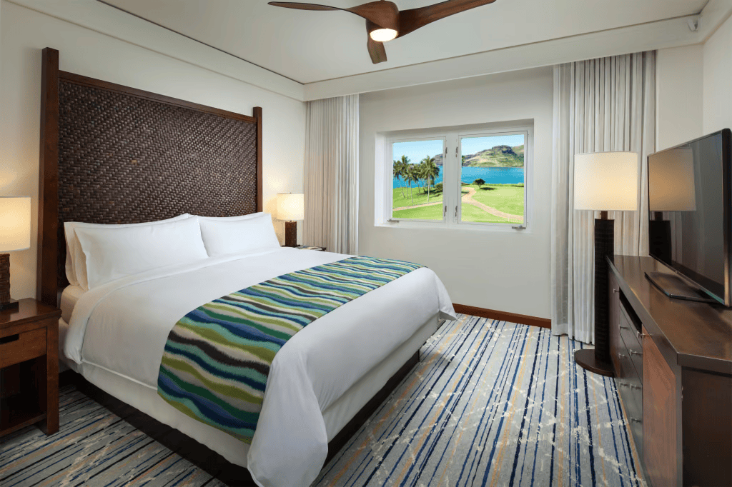 Coastal king bedroom with ocean views and serene resort-style comfort