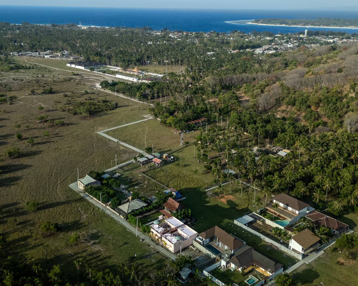 Enjoy the quiet part of the island between the palm trees.