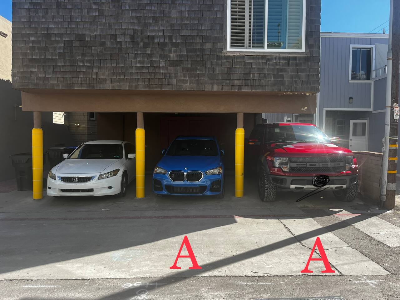 Carport. Parking available for one car, additional space provided based on availability (middle space)- inquire with host.