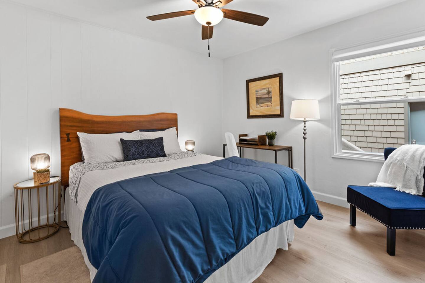 Bedroom #1  with desk for remote work by the beach! We have Wifi!