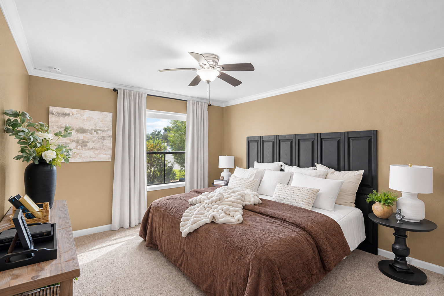 Bright, cozy bedroom with plush king bed and stylish modern touches