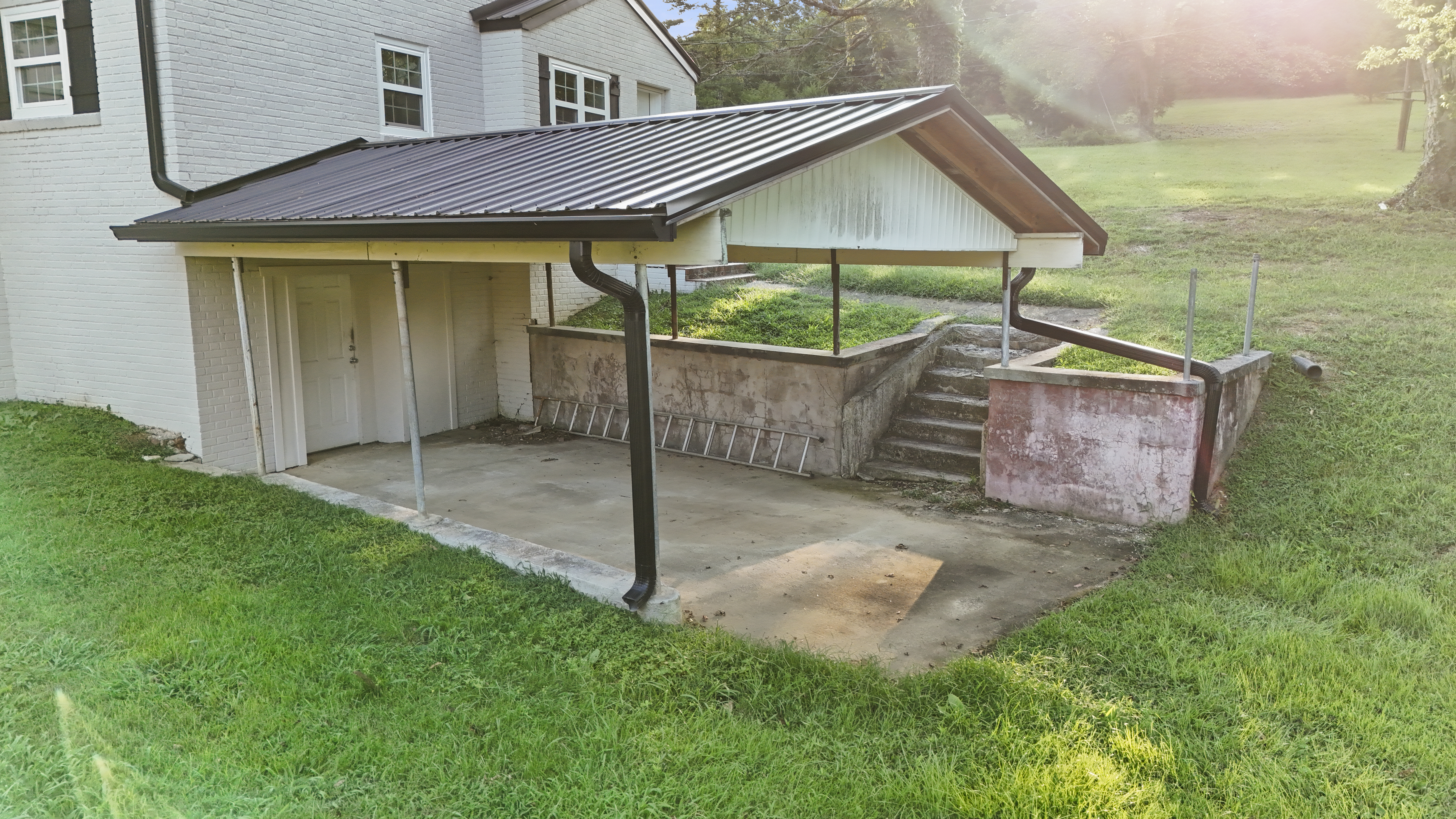 Covered outdoor patio with yard access and private exterior entry