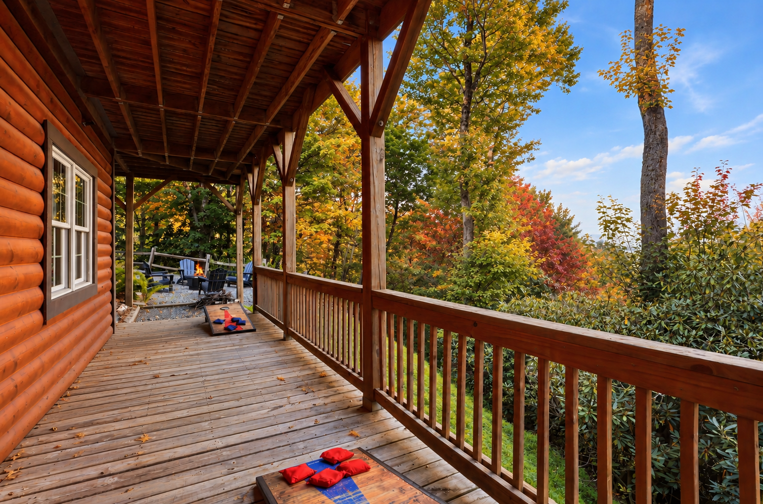 Covered cabin porch with views, cornhole, and fire pit access