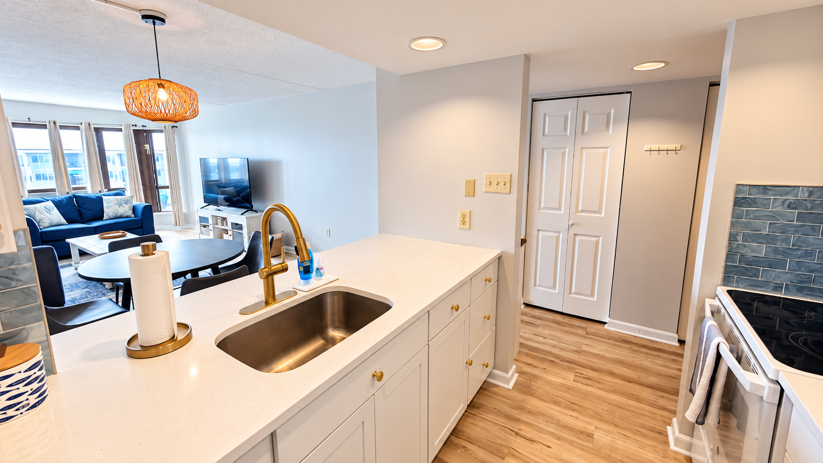 Bright modern kitchen with open living area and natural light