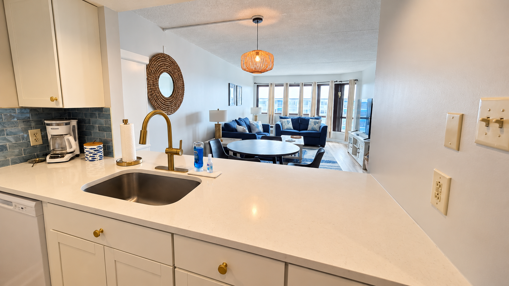 Bright open kitchen and living area with stylish finishes and natural light