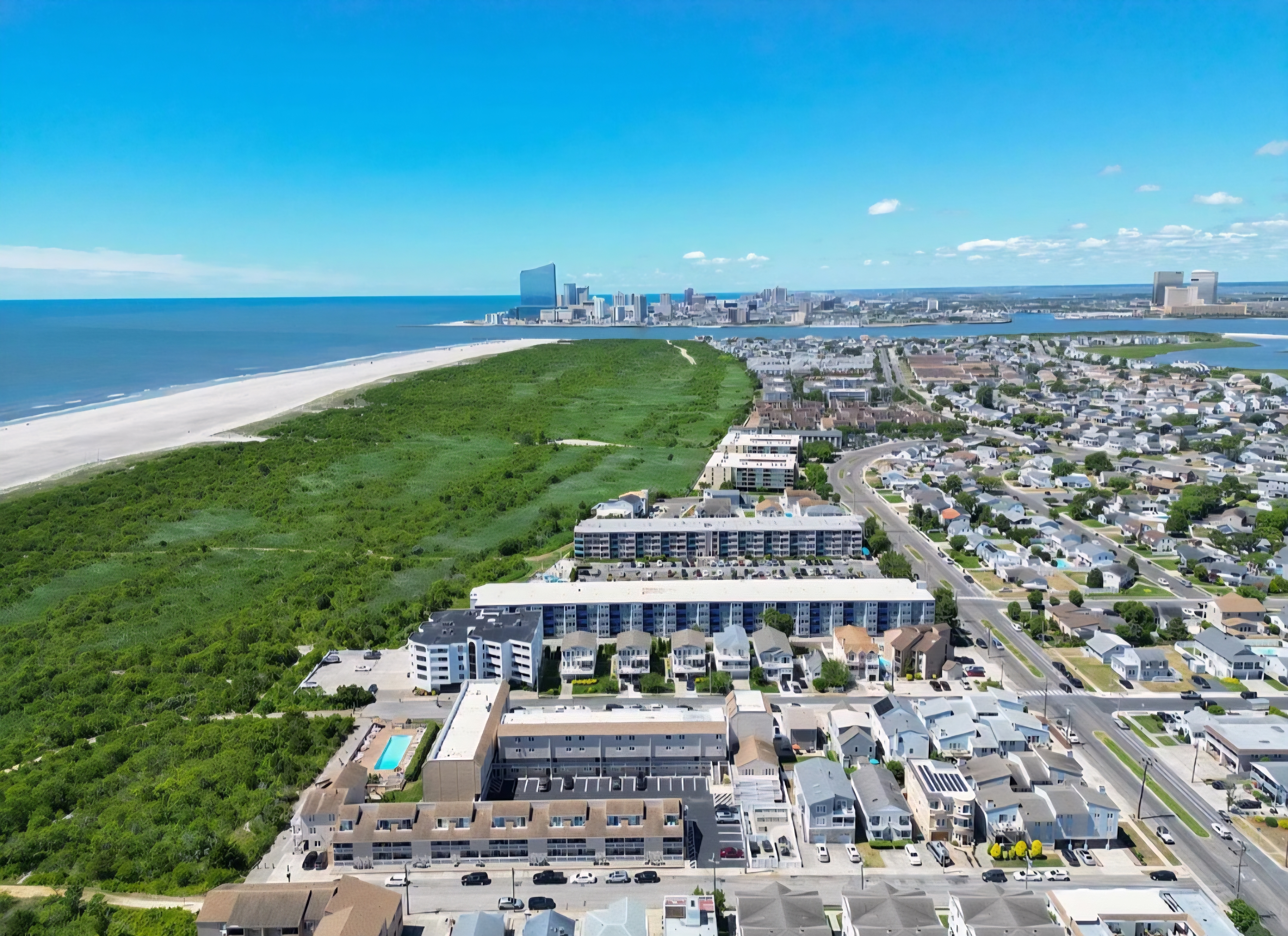 Aerial coastal retreat near the beach with sweeping ocean and skyline views