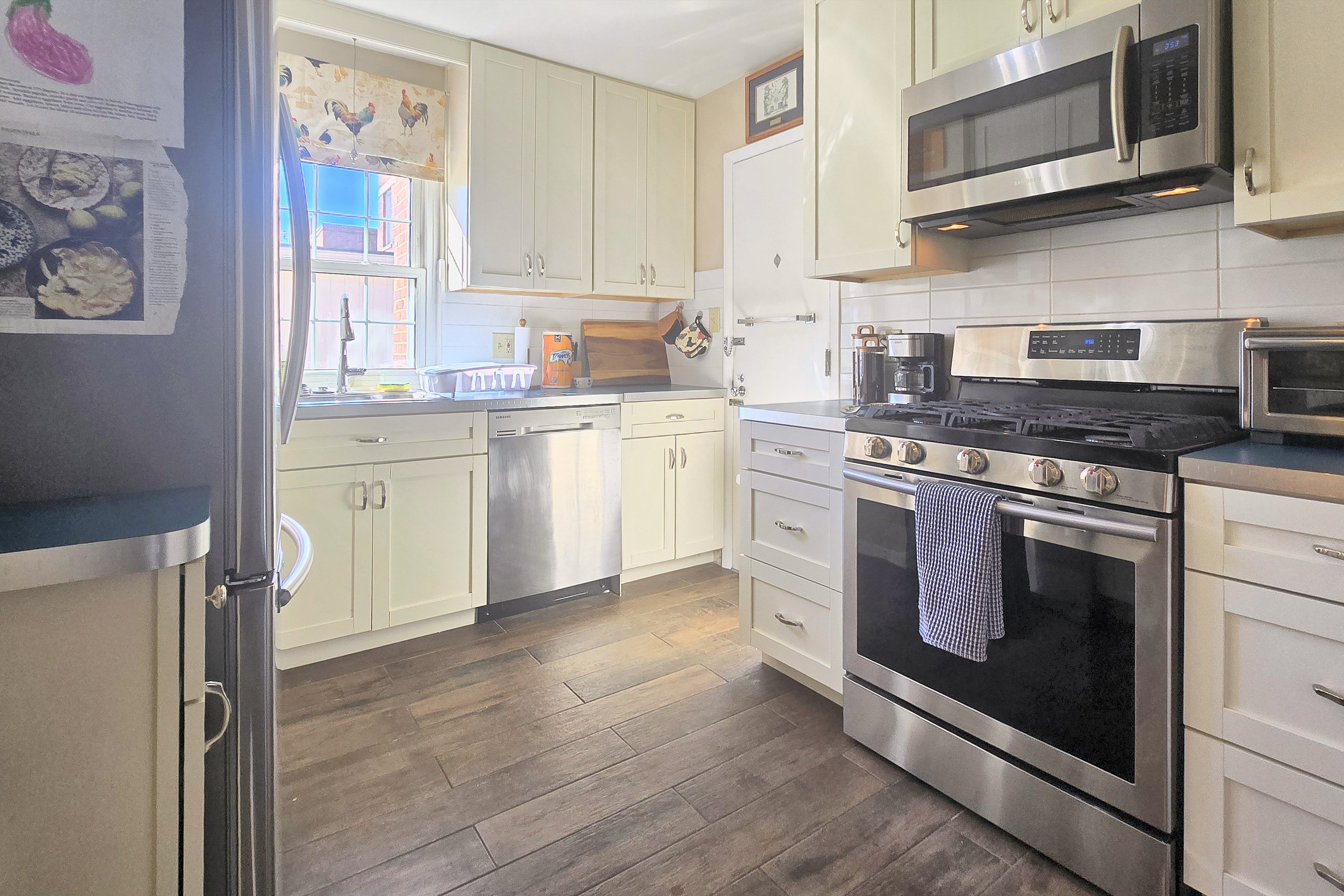 Bright kitchen with stainless appliances and ample cabinet space