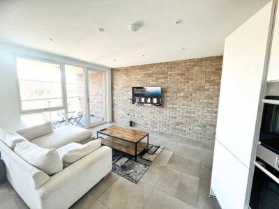 Comfortable sofa and reclaimed-wood coffee table in the living room