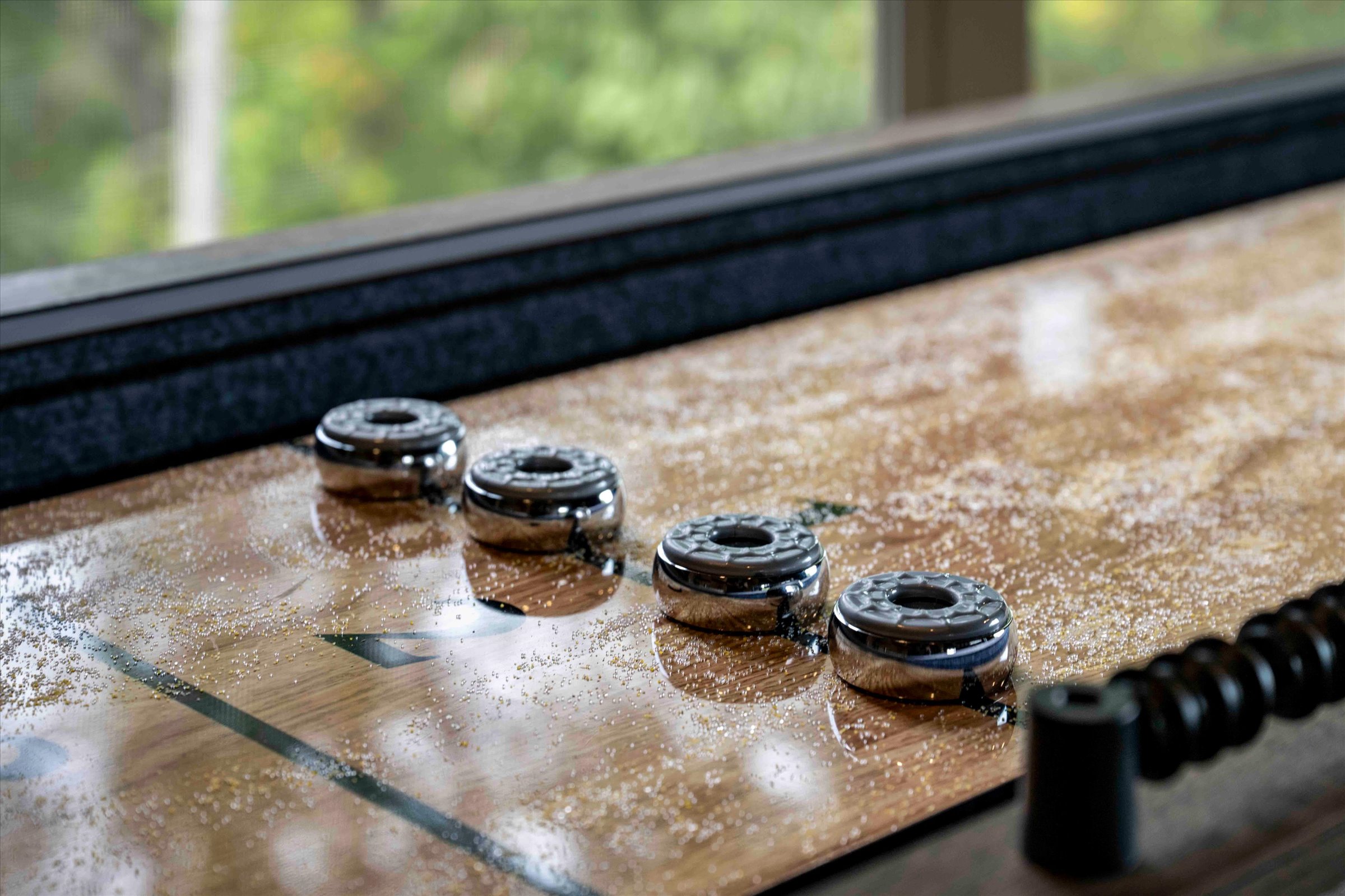 Polished shuffleboard table for relaxed indoor fun and friendly games