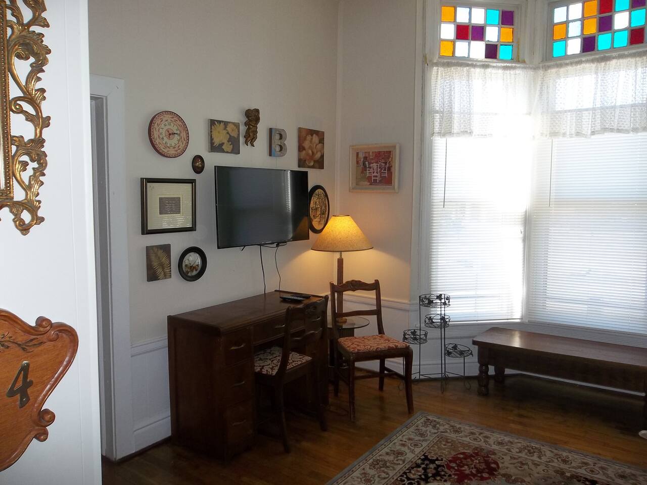 Comfortable desk for working, 40" TV for entertainment with Roku.