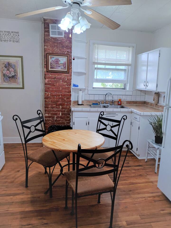 A sunny kitchen on the south east corner catches the morning rays while you cook breakfast for the family or just a friend or two . Who wants bacon and eggs?
