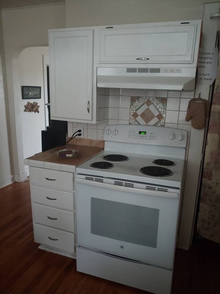 Range and oven plus work surface.