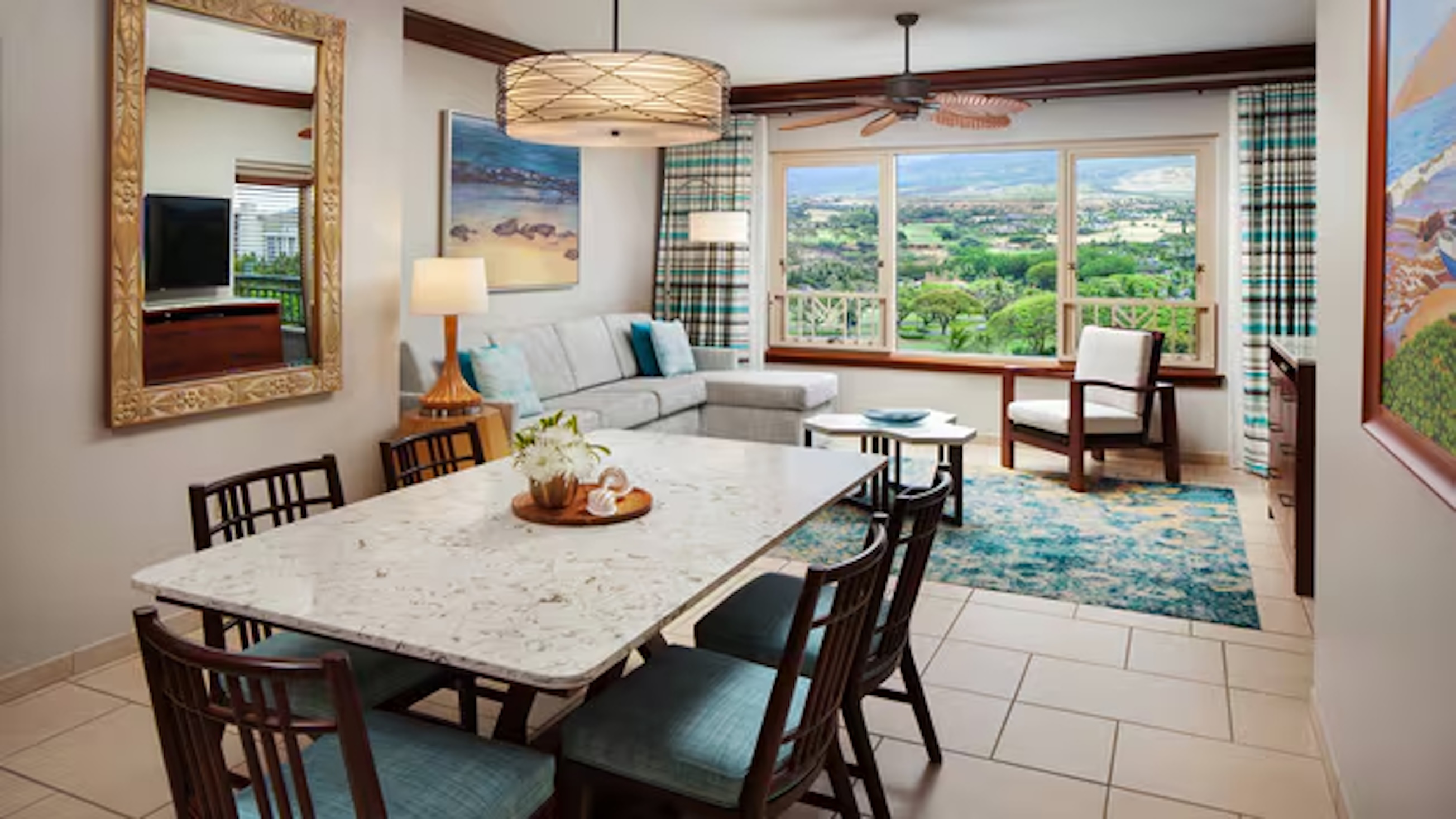 Bright living space with dining area and stunning panoramic views
