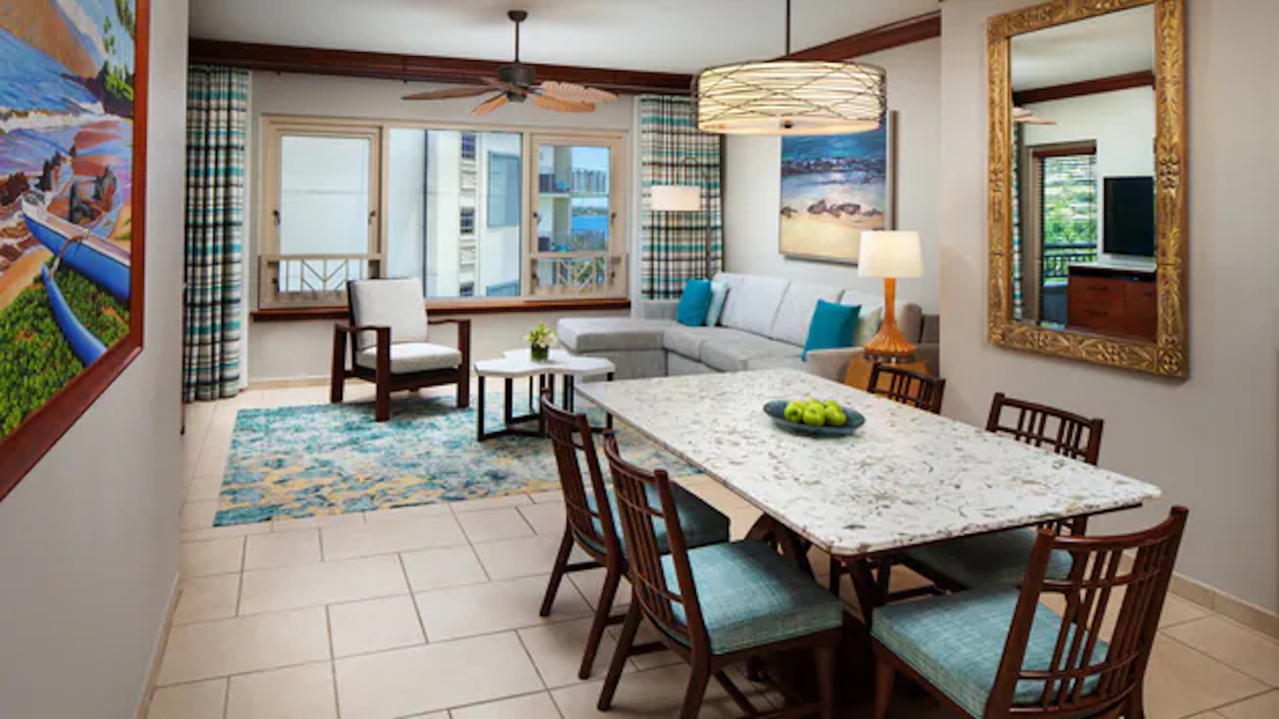 Bright coastal-style living area with dining for 6 and lots of natural light