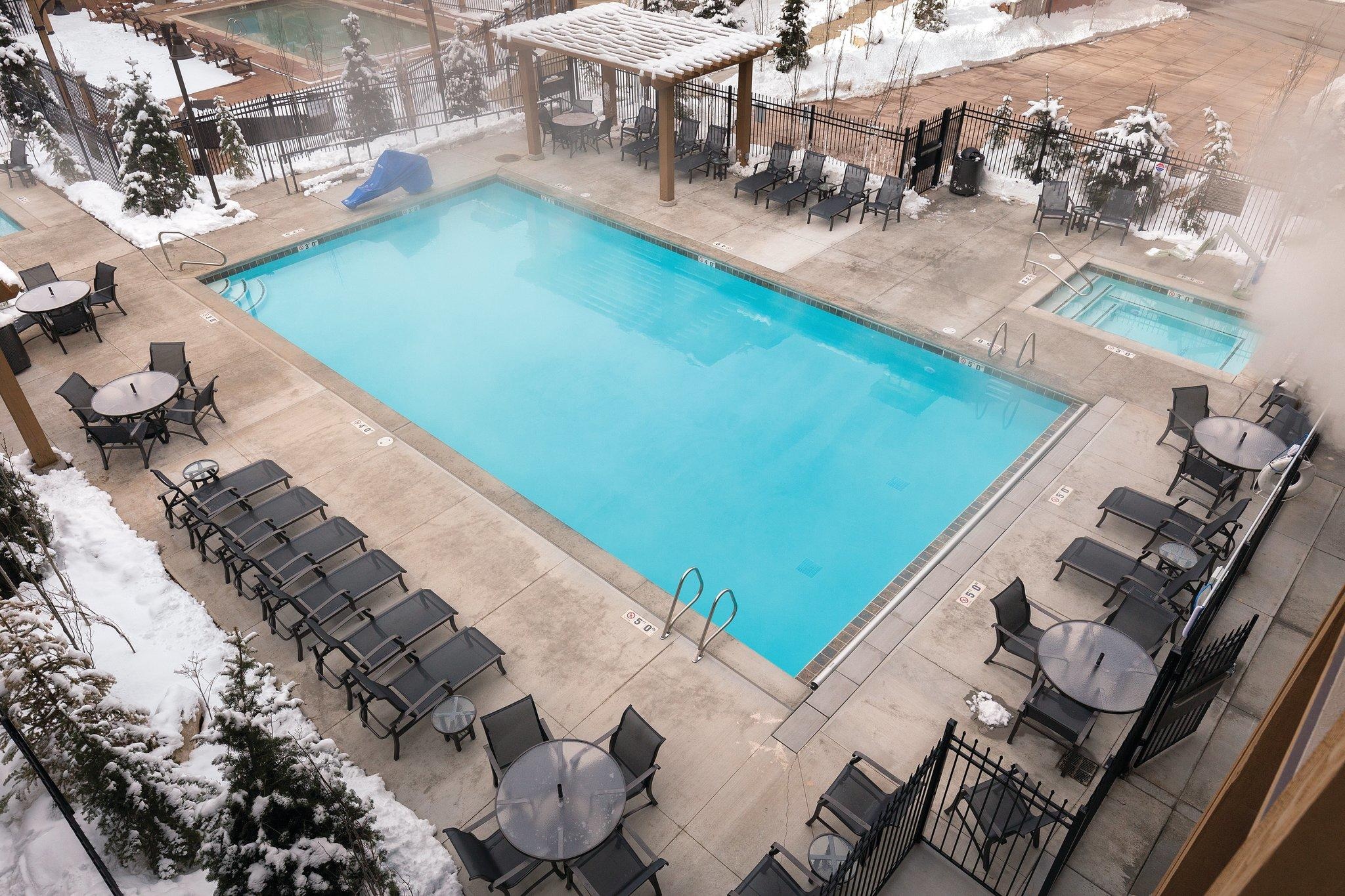 Year-round heated pool & hot tub with snowy mountain-resort ambiance