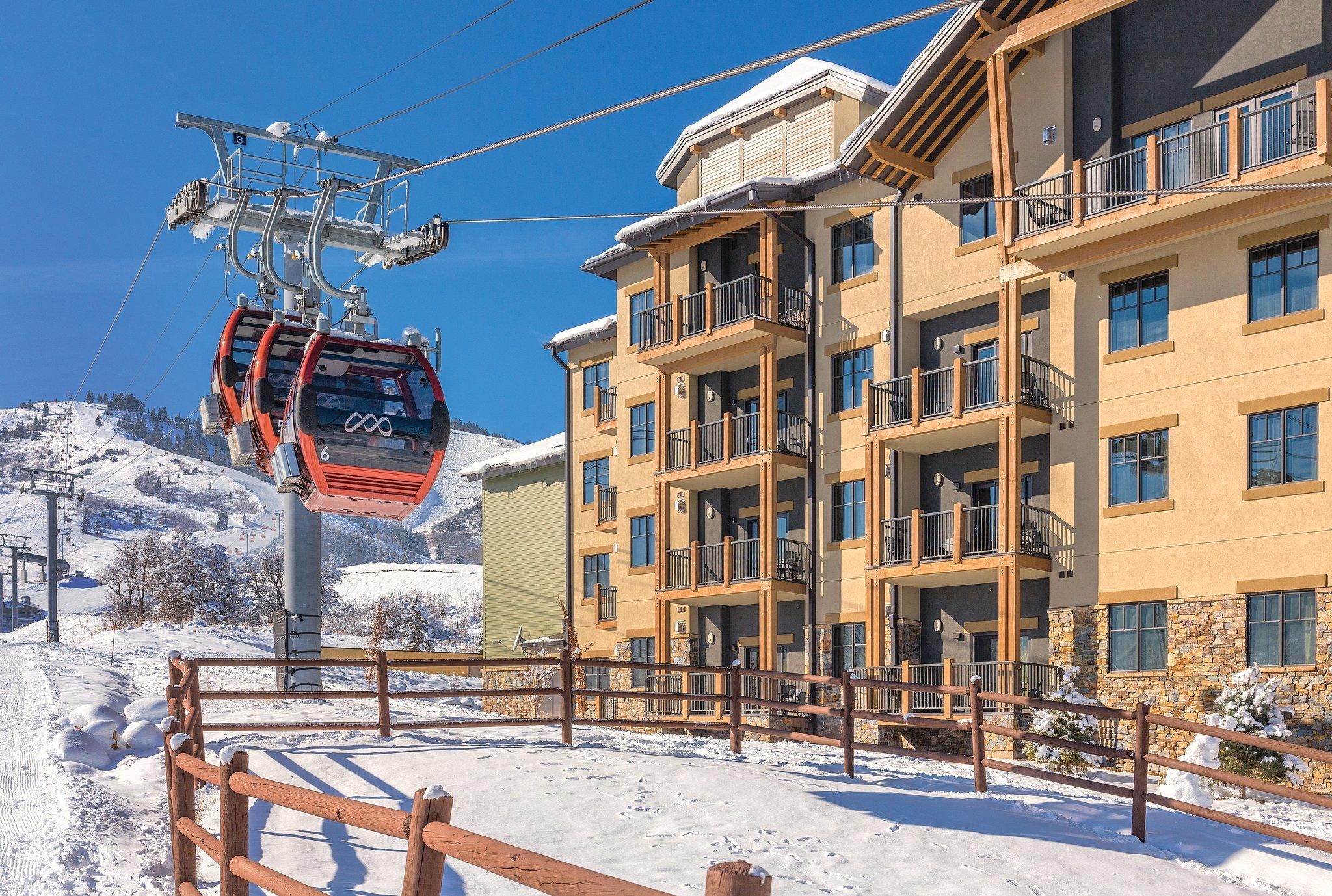 Ski-in/ski-out lodge beside the gondola with private balconies