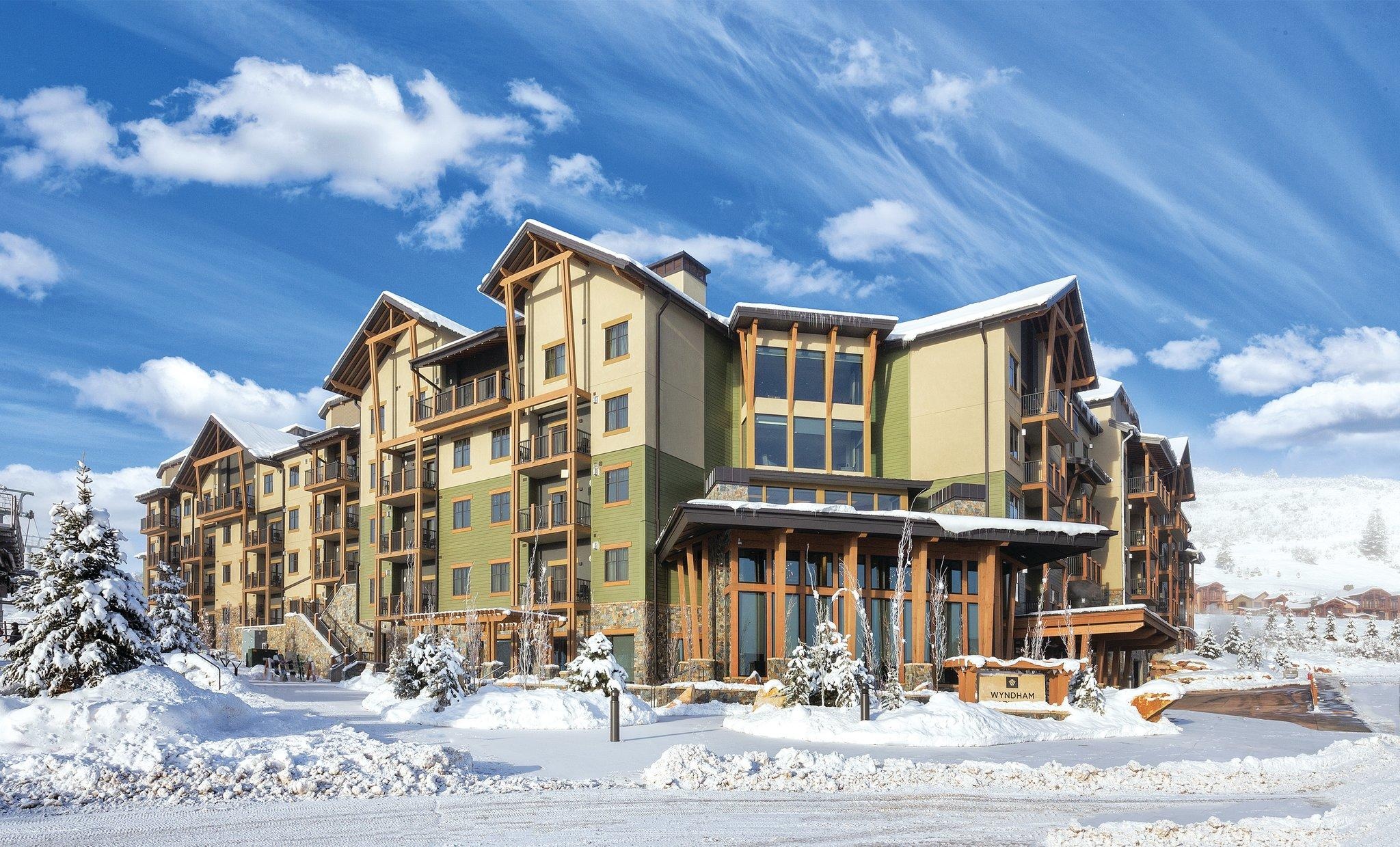 Alpine-style mountain retreat with balconies in a stunning snowy setting