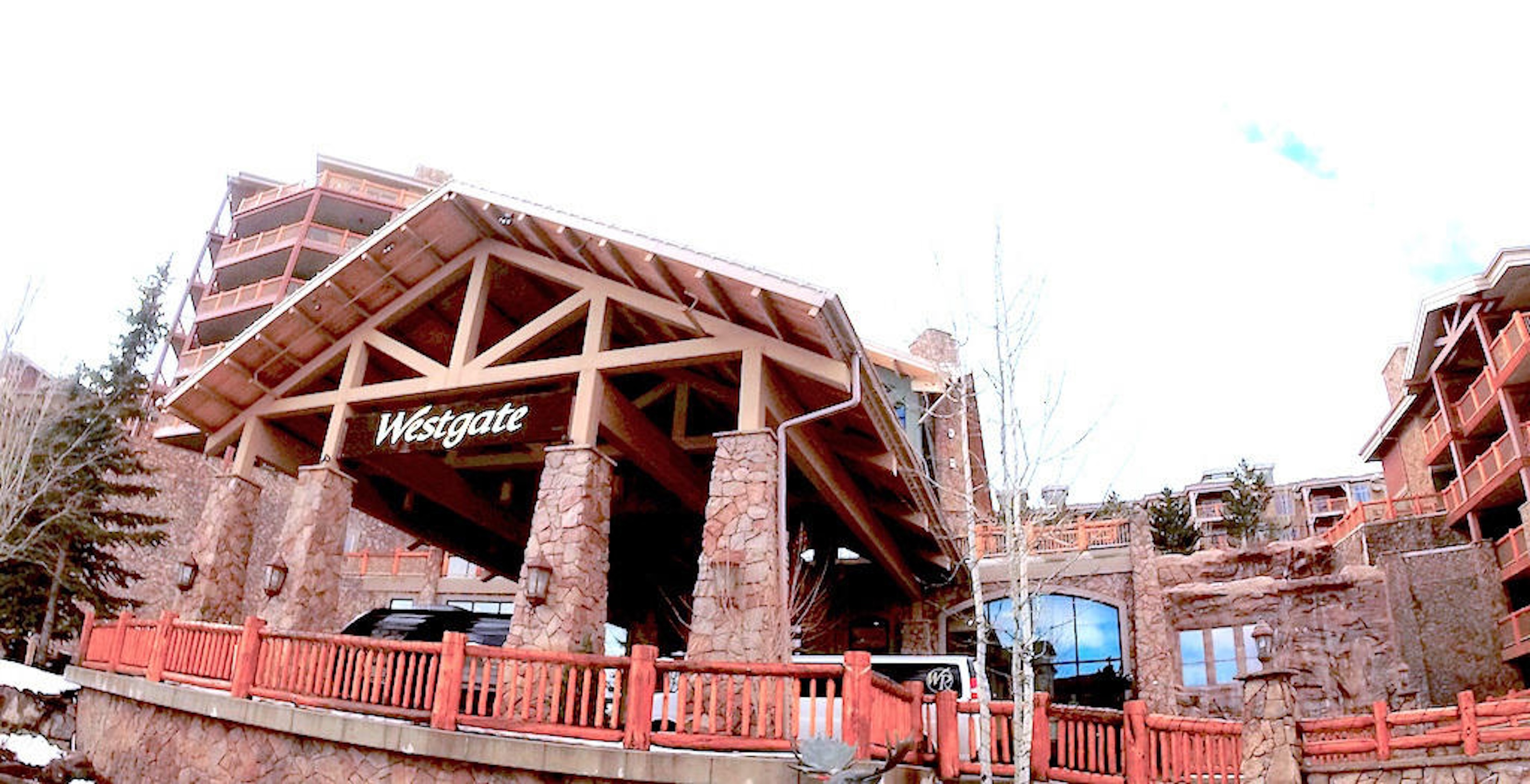 Grand Westgate mountain lodge entrance with rustic alpine charm