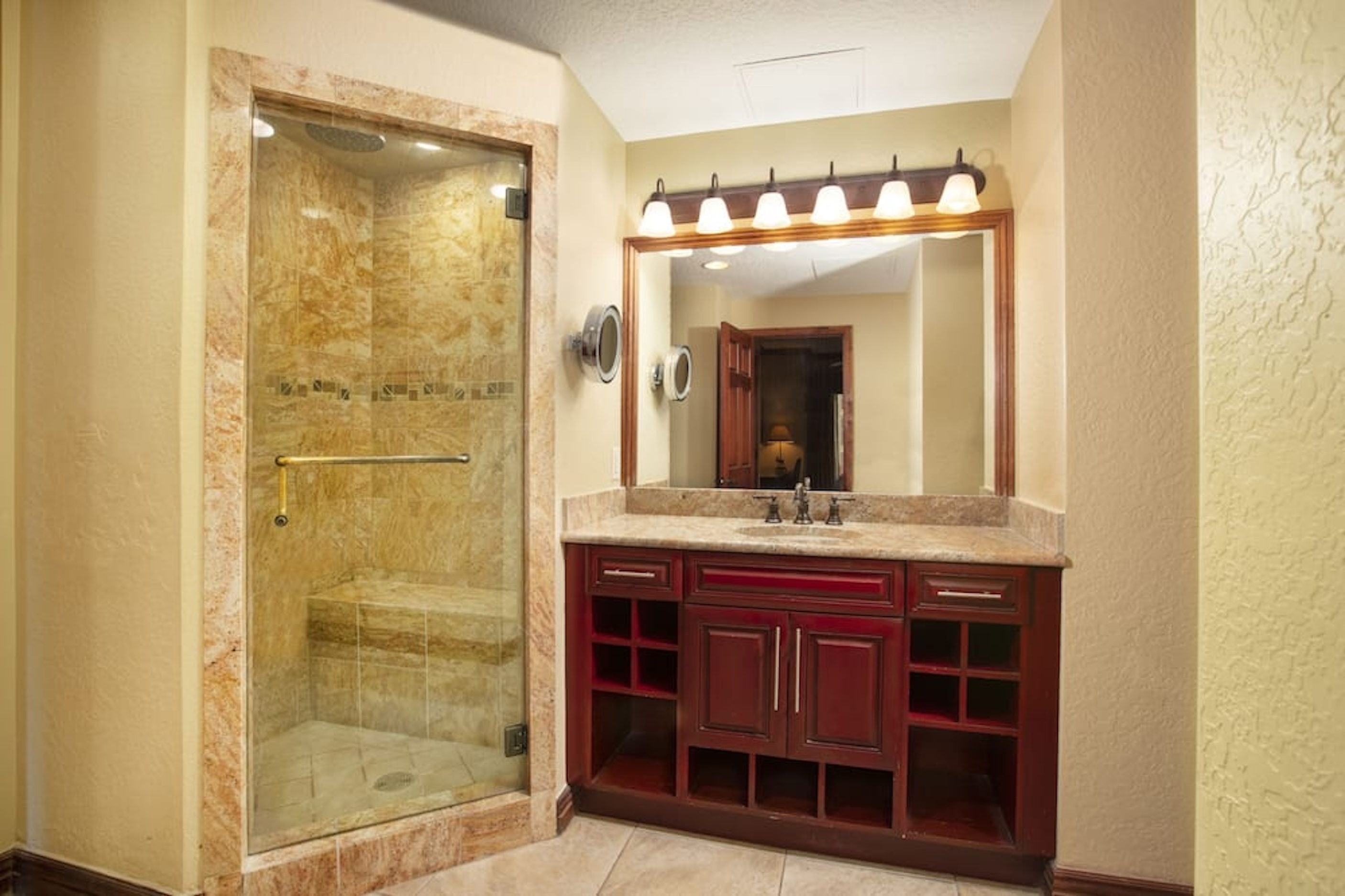 Spa-like bathroom with walk-in glass shower and elegant double vanity