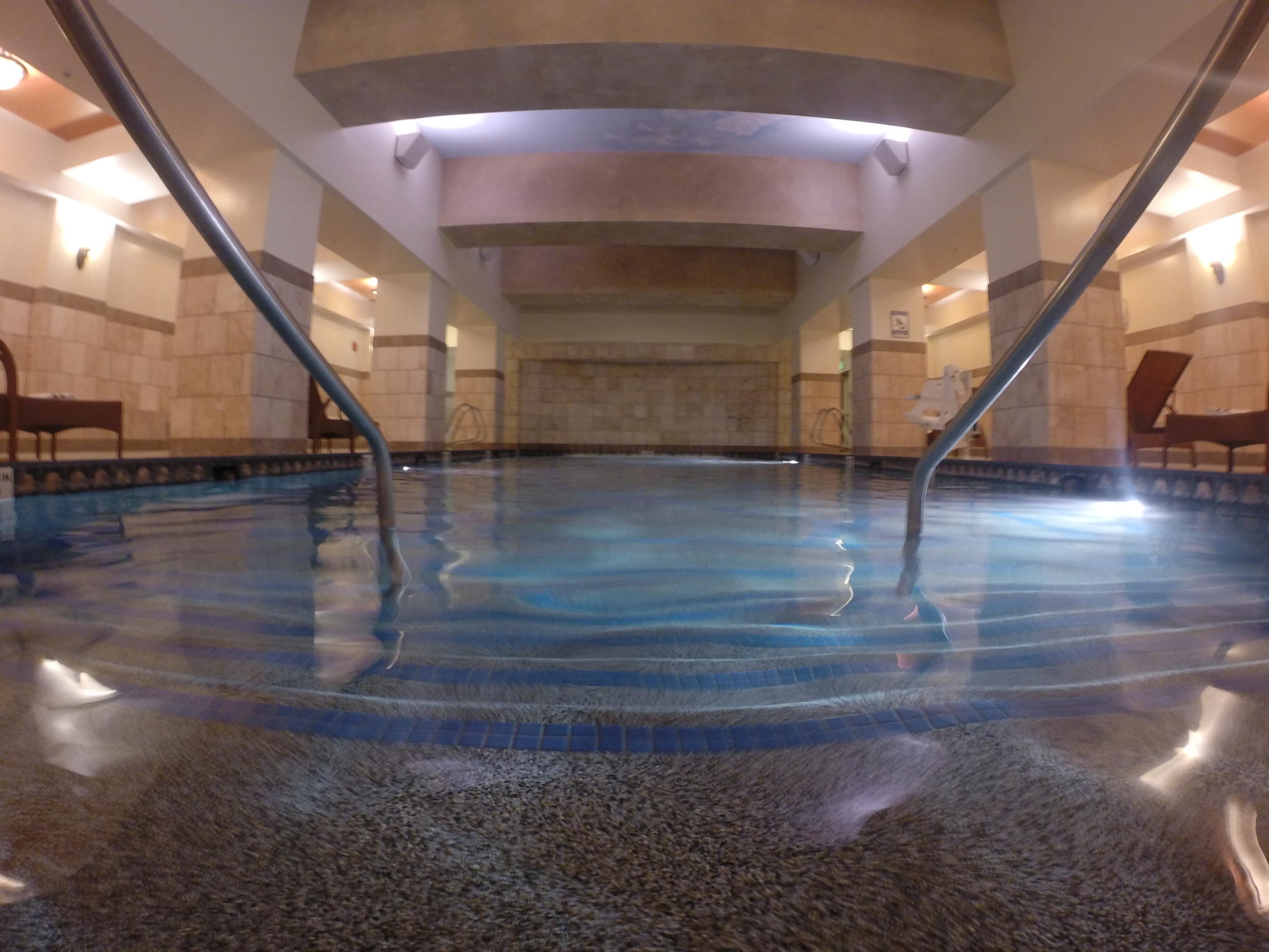 Relaxing indoor pool with spa-like ambiance and easy step-in access