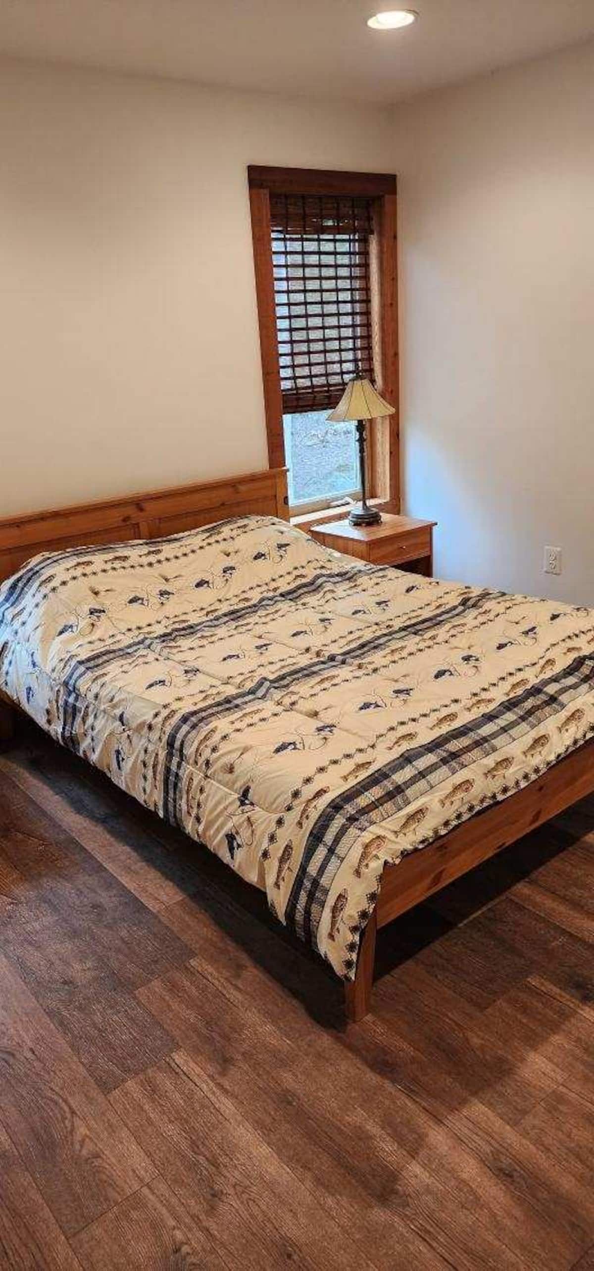 Cozy rustic bedroom with warm wood accents and inviting natural light