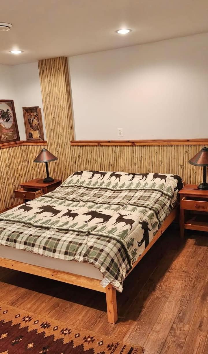 Cozy rustic bedroom with lodge-style charm and warm wood accents