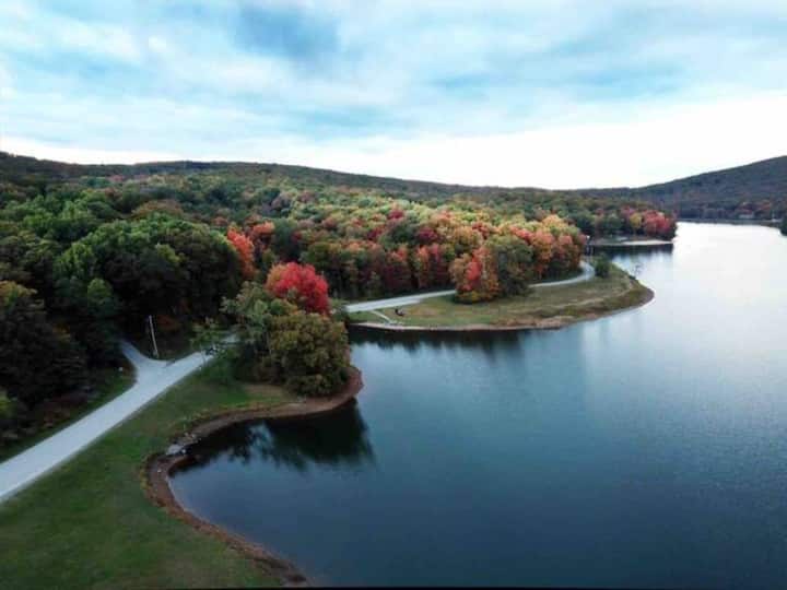 Scenic lakeside views framed by vibrant fall foliage
