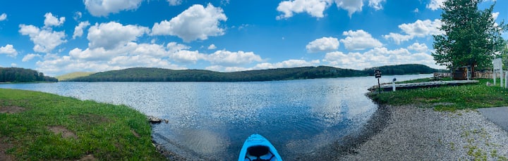 Serene lakefront launch with kayak access and wide water views