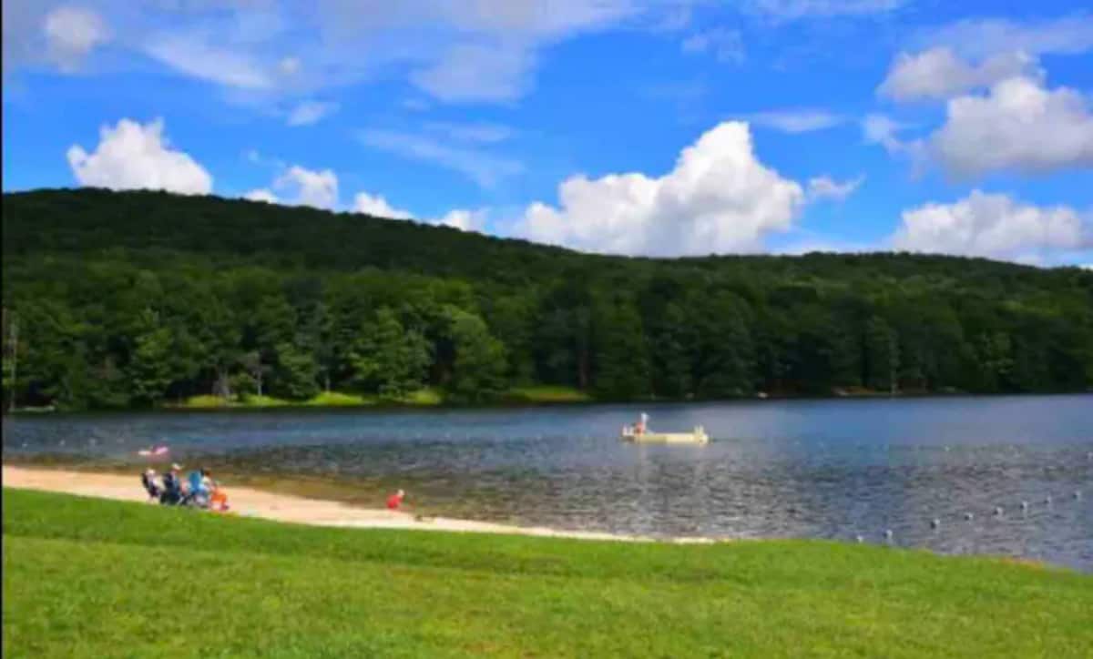 Peaceful lakefront beach with scenic views and relaxing outdoor space