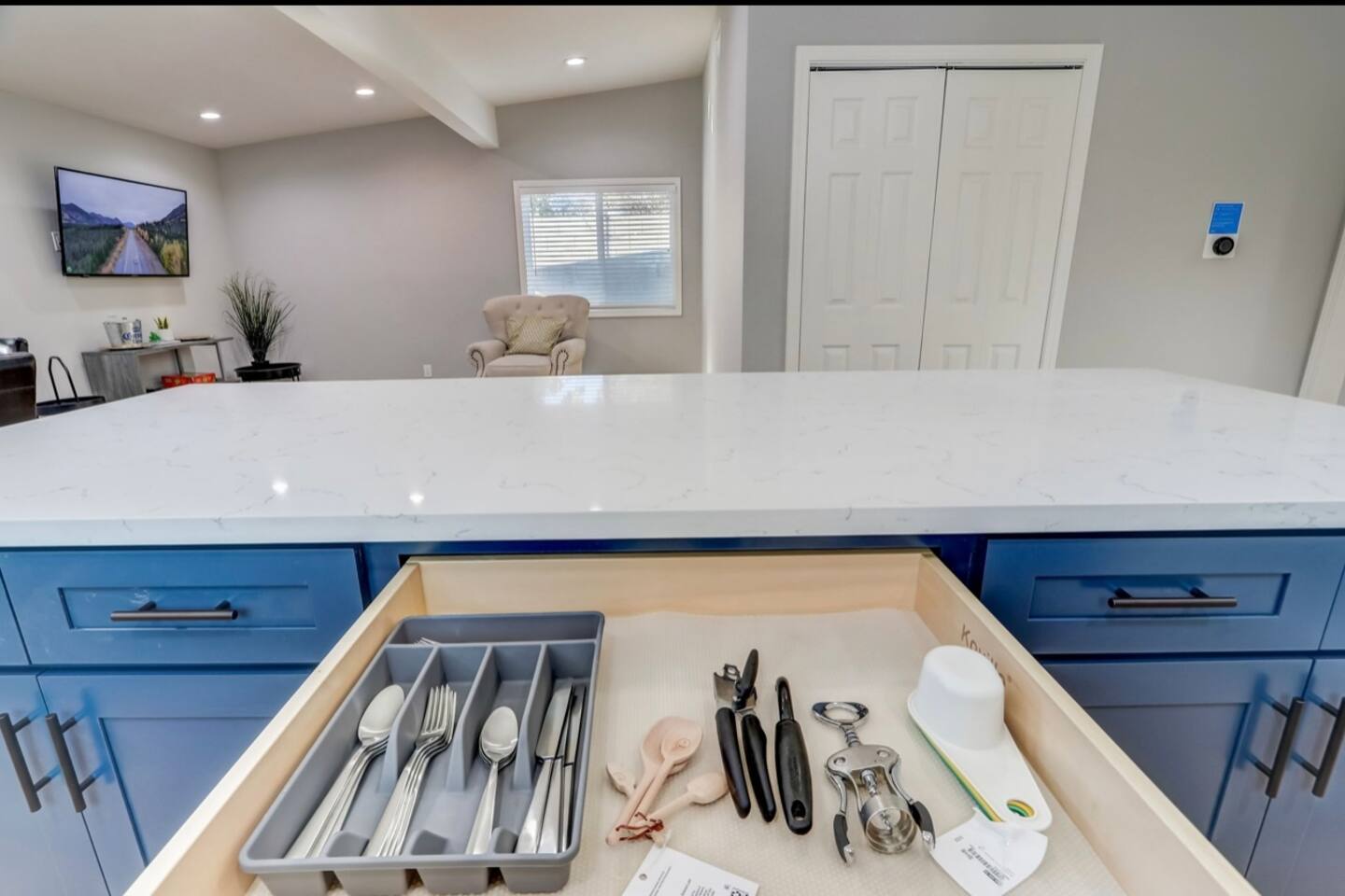 Organized kitchen drawer with full utensil set