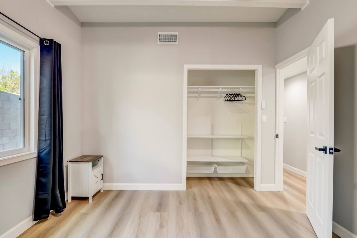 Clean lines, light flooring, and organized storage.