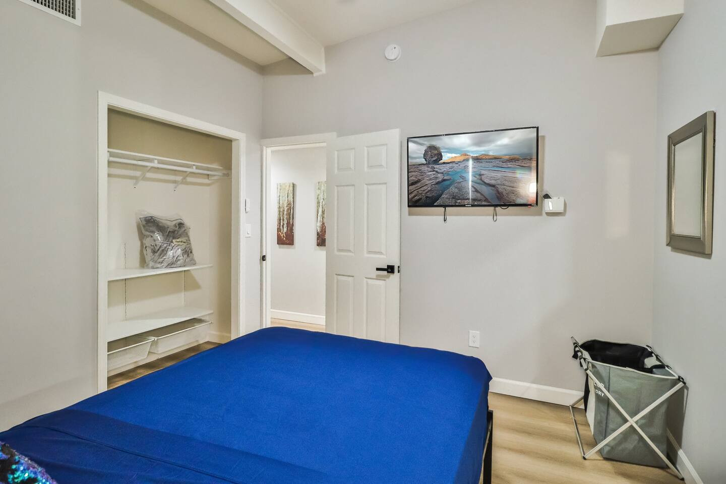 Cozy Bedroom with Smart Storage & Built-In Shelving