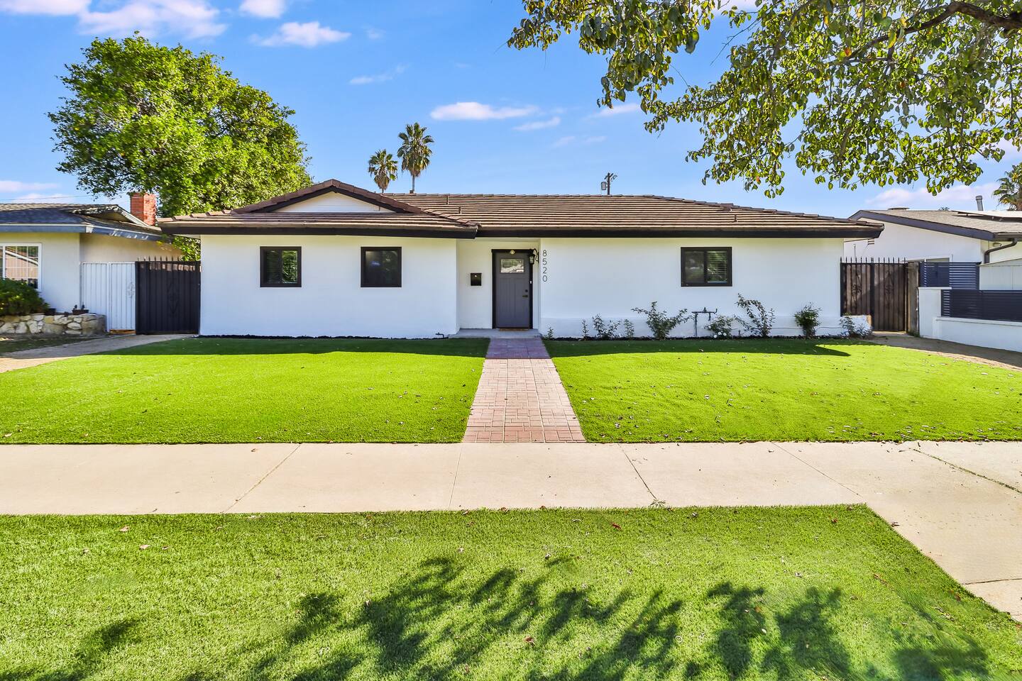 Well-Maintained Front Yard with Brick Walkway & Porch Entry – Ideal for Families & Long-Term Guests