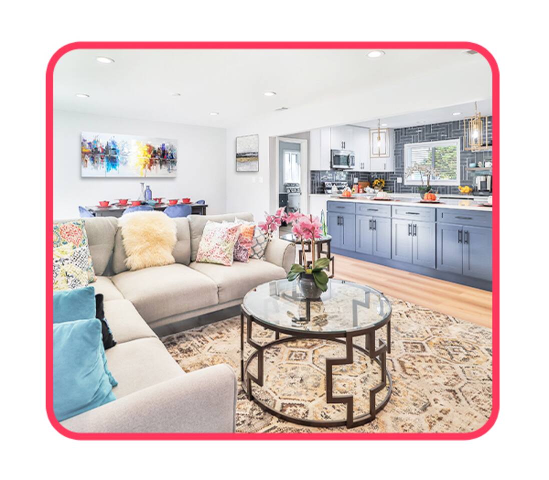 Bright Living Space with Cozy Sofa, Modern Kitchen & Artistic Touches – Ideal for Families & Long-Term Guests