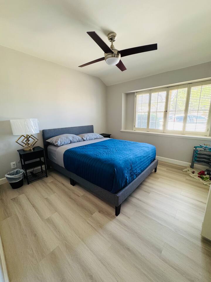 BEDROOM WITH CEILING FAN, LARGE WINDOW