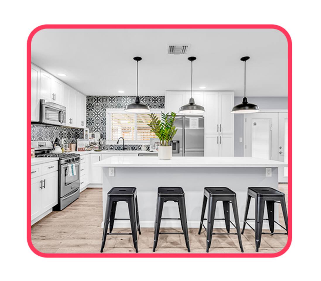 Modern culinary space with stainless steel appliances.