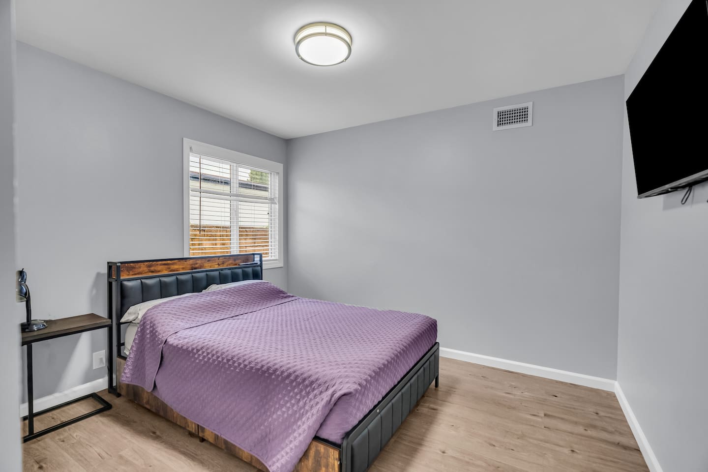 Comfortable retreat with closet space and streaming-ready setup.