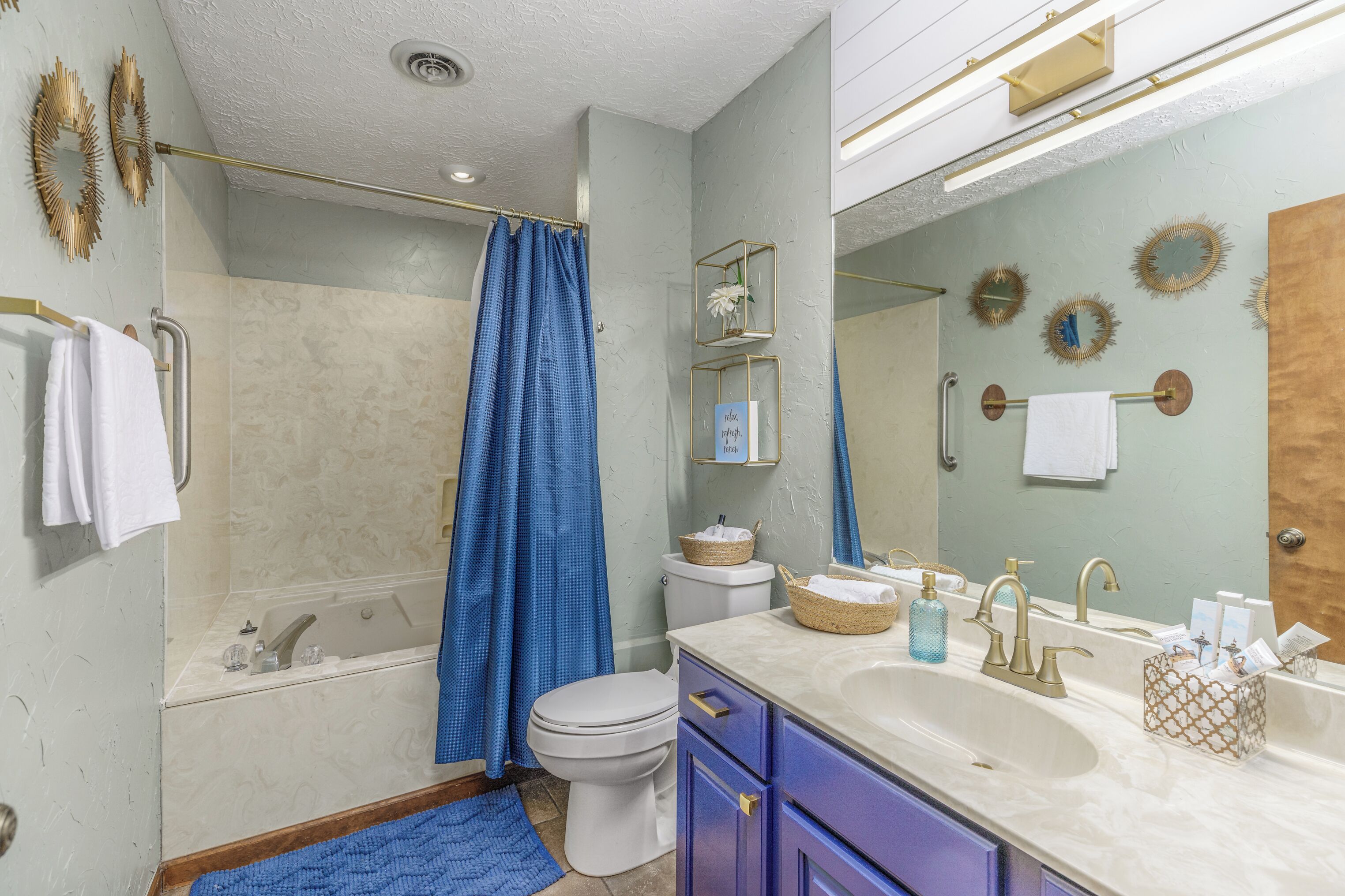 Relax and recharge in the spacious bath with a soothing jetted tub.
