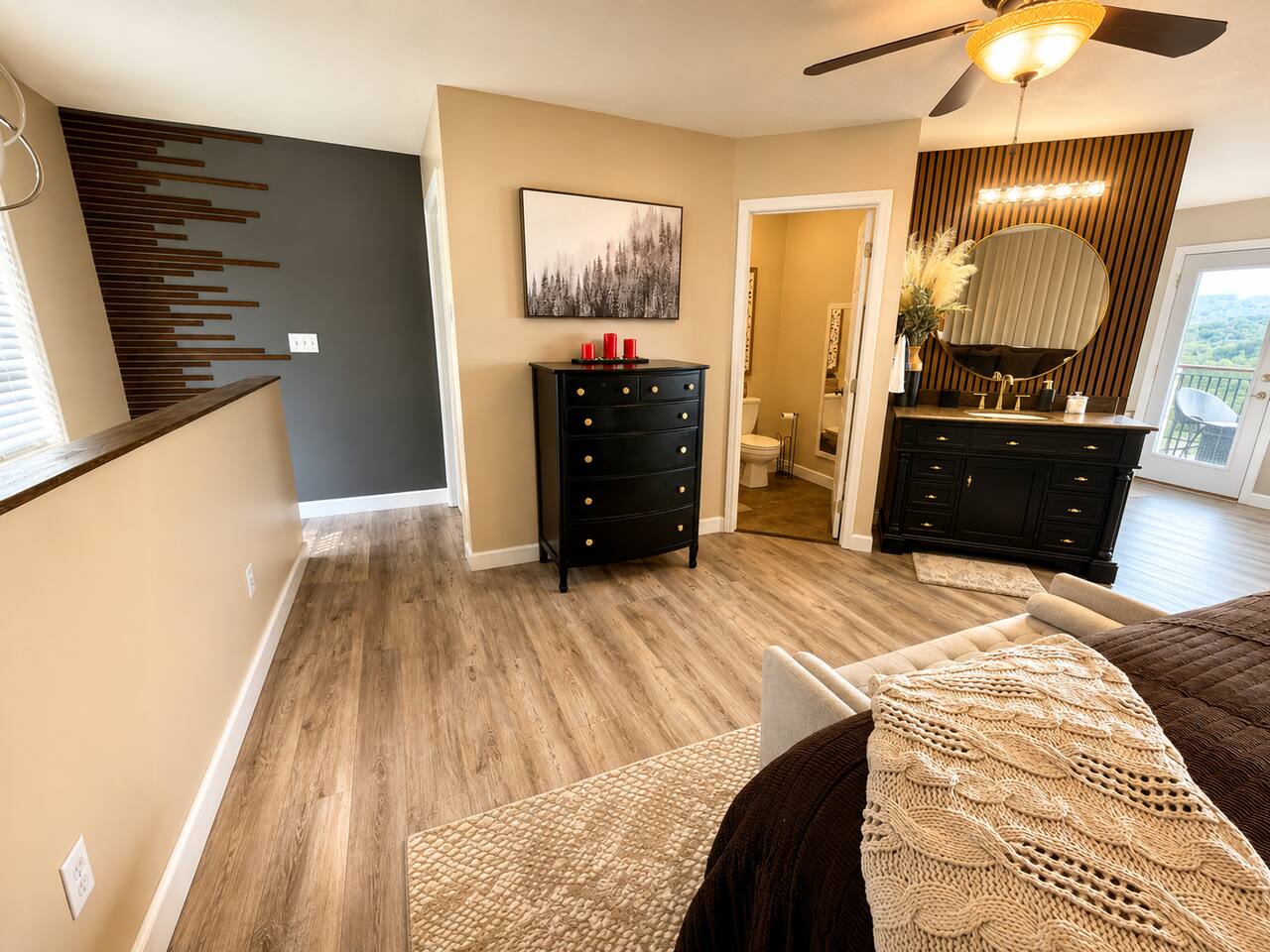 A bright, inviting vanity area with plenty of space to get ready for the day or a special evening out. Enjoy a comfortable spot for hair, makeup, and your morning routine before heading out to explore the Smokies.