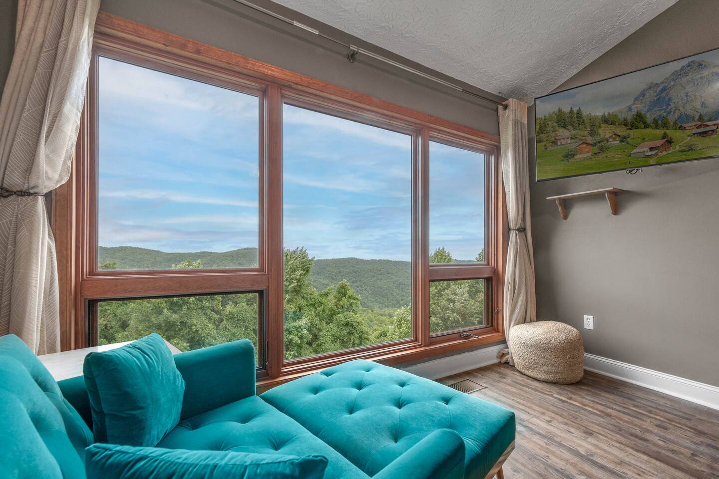 Lounge chair in master suite to relax enjoying beautiful Mountain View’s.