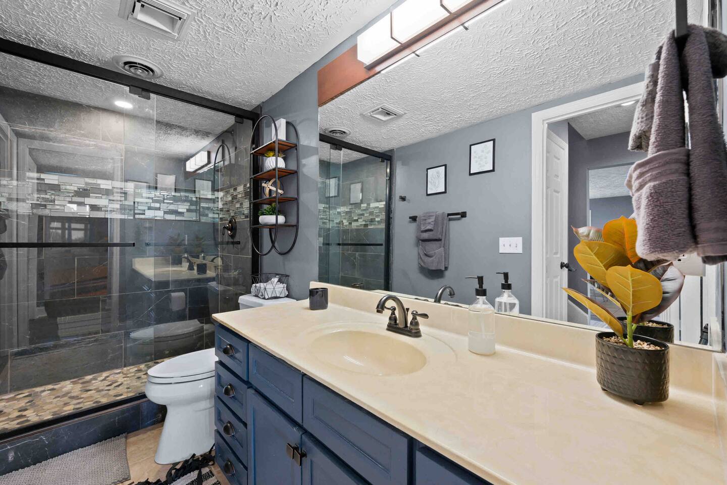 Bathroom adjoining second king suite with standup shower
