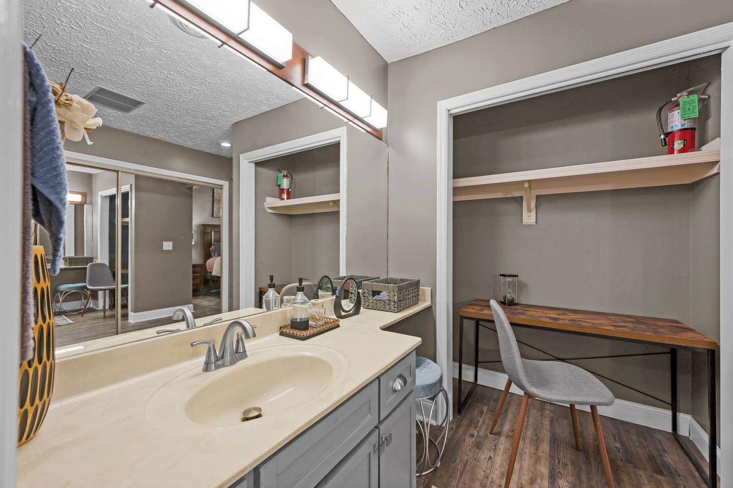 Vanity and desk area in upstairs suite