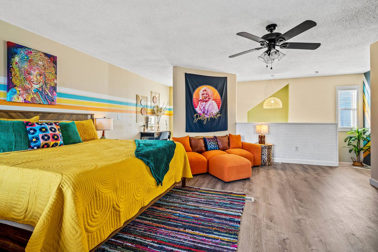 A spacious, colorful retreat perfect for families! Cozy beds and a comfy sitting area give everyone room to relax, while fun Dolly Parton-inspired décor adds a playful touch of Smoky Mountain charm to your stay.