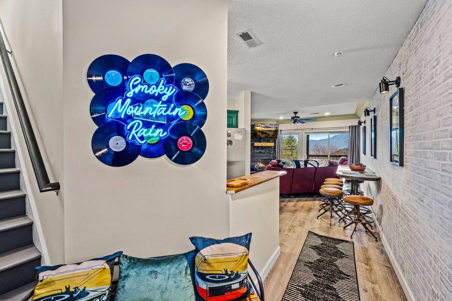 Welcome to Smoky Mountain Rain! From the moment you walk in, fun music-inspired décor sets the stage for a one-of-a-kind family getaway, with an open living space and beautiful mountain views waiting just ahead.