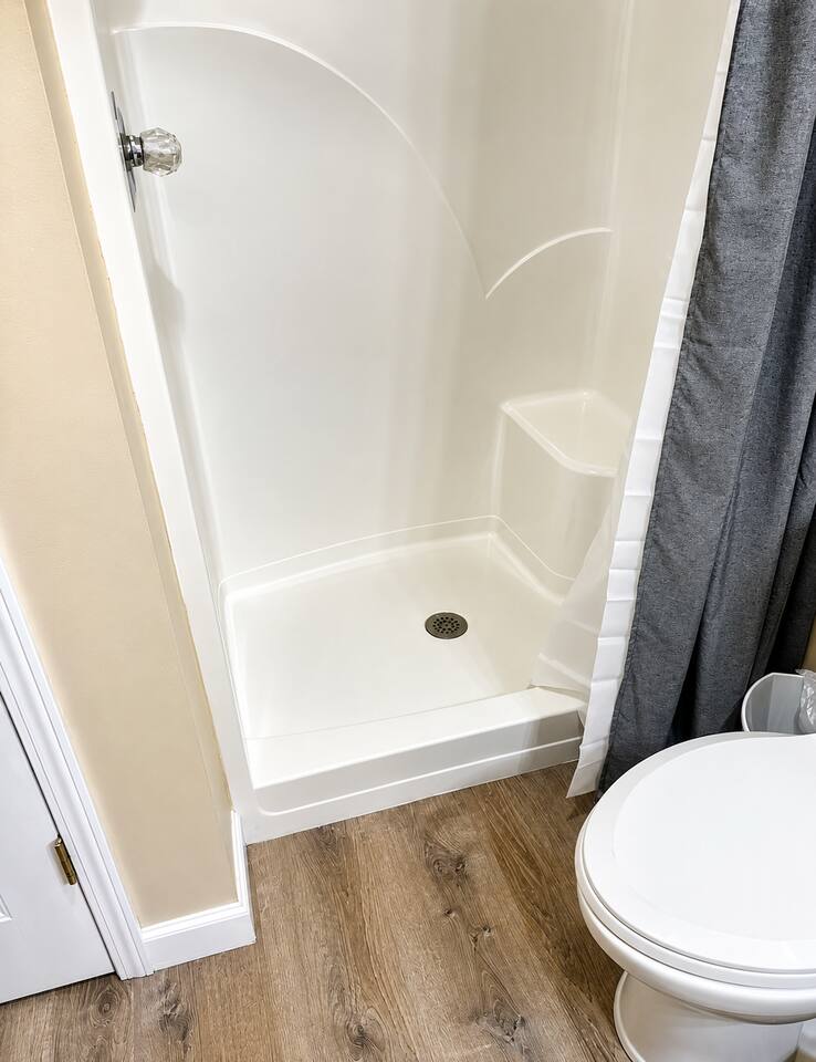 A clean, convenient walk-in shower makes family stays easy, with plenty of space to freshen up after a fun-filled day exploring the Smoky Mountains.