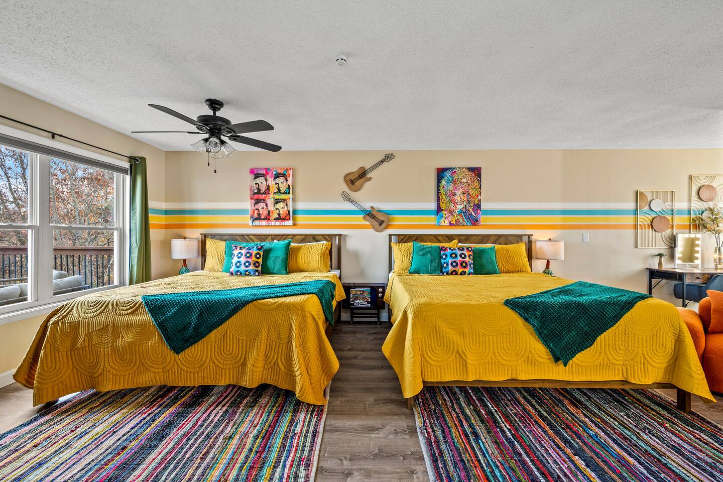 A spacious, colorful bedroom perfect for families! Two large, comfortable beds give everyone room to recharge, while playful music-inspired décor and plenty of open space make this a fun retreat after a day exploring Gatlinburg.
