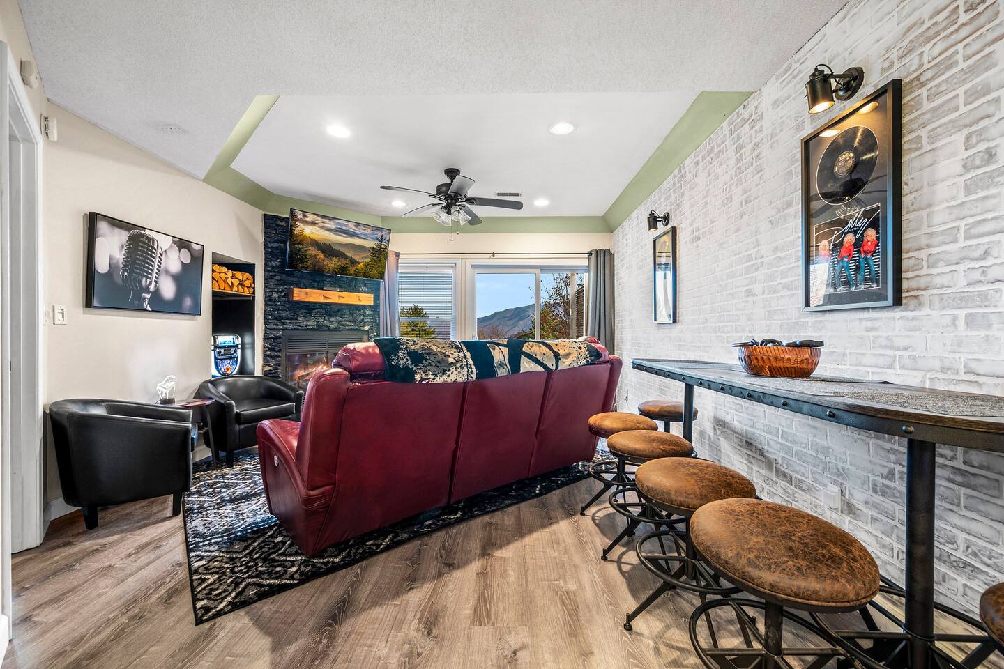 Gather the family for meals, snacks, or game night at the spacious bar-style dining area! With comfortable seating and an open layout overlooking the living room, everyone can stay connected while enjoying time together.