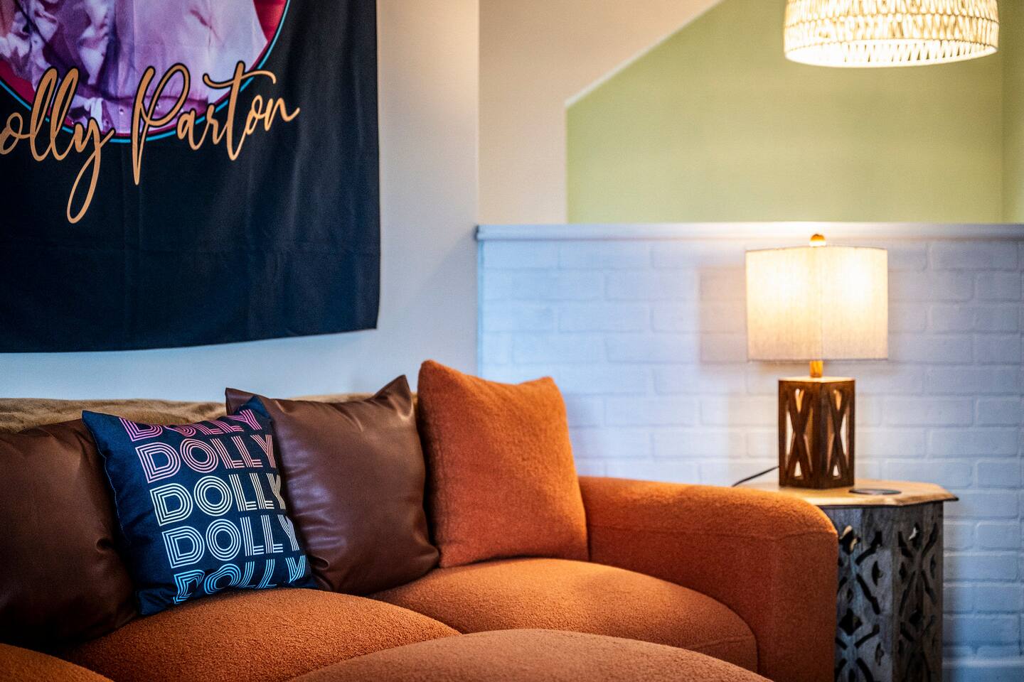 A cozy sitting nook made for relaxing together! Sink into the comfy sofa after a day of family adventures while fun Dolly Parton-inspired touches bring a little extra Tennessee charm to your Smoky Mountain getaway.