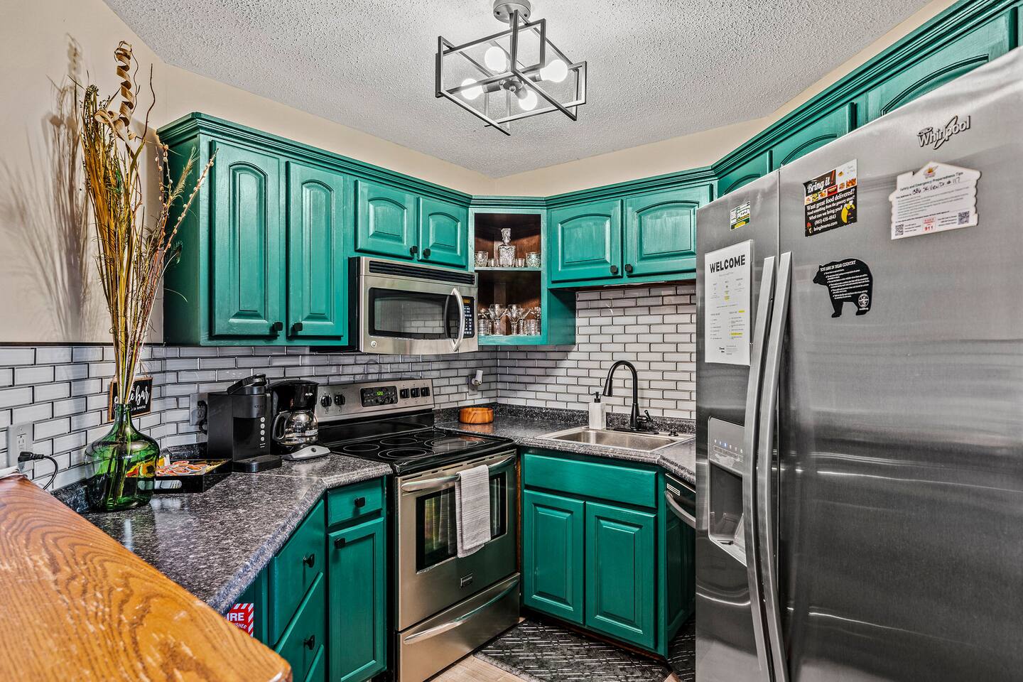 A bright, fully equipped kitchen with plenty of space to prepare family favorites! Enjoy stainless steel appliances, ample counter space, and everything you need for easy breakfasts, snacks, and meals during your Smoky Mountain getaway.